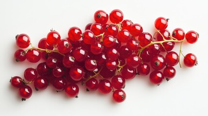 A vibrant bunch of red currants, with their shiny, translucent skin, arranged on a white background.