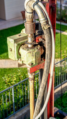 Tools for drilling a well under water. Installing the system for outdoor garden irrigation