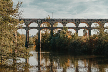 Railway Bridge with river in Bietigheim-Bissingen, Germany. Autumn. Railway viaduct over the Enz...