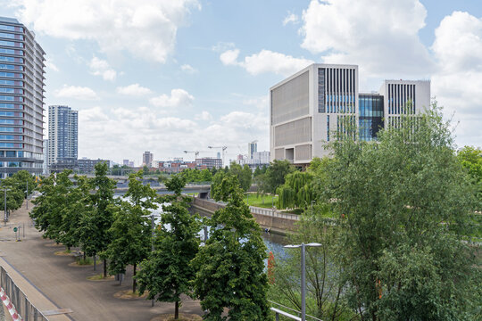 Looking down the River Lea in Stratford to the UCL East University building. London - 12th June 2022