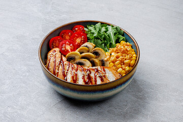 A vibrant poke bowl with grilled chicken