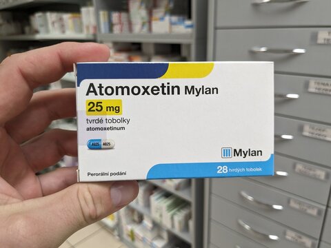Prague,Czech Republic-August 7 2024: ATOMOXETIN MYLAN box of medication with ATOMOXETINE active substance by MYLAN,used for treatment of ADHD.