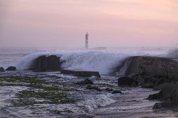 Sea storm at sunset