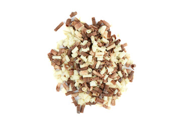 Top view of a pile of white and dark chocolate chips on a white background.