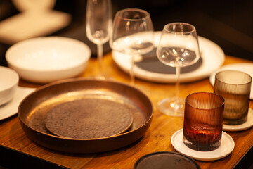 Close up on a table with luxury crockery, no people are visible.