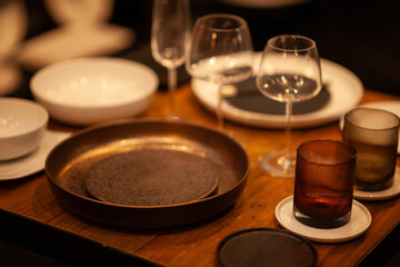 Close up on a table with luxury crockery, no people are visible.