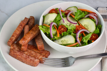 garden salad served with  spam fries,