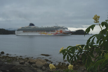 Modern family cruiseship cruise ship liner Sun anchoring in bay of Sitka, Alaska during Last...