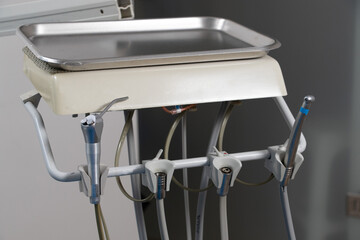 Dental drill container on dental chair for dental clinic