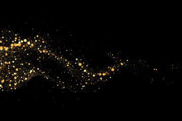 Scattered golden particles on dark background. Holiday background or design element. New Year and Christmas