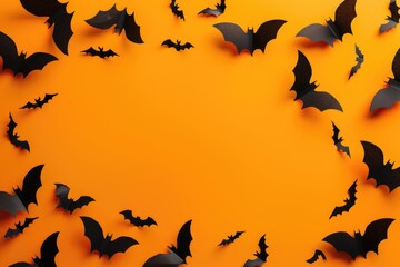Fototapeta premium A group of bats in flight, soaring through the evening sky