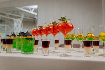 Welcome drink with cocktail glasses and drinks at an event. Alcoholic beverages at a wedding