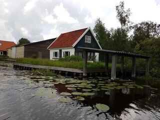 Obraz premium house at the water