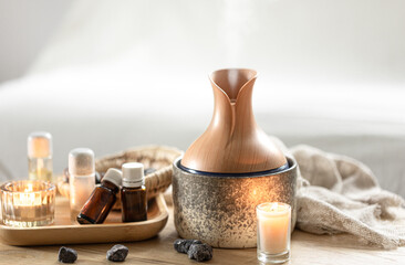 Spa composition with air humidifier and aroma oils.