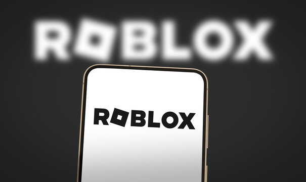 Roblox company logo displayed on smartphone