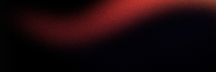 Abstract blurred red and black background with soft gradient effect, ideal for design and artistic projects.