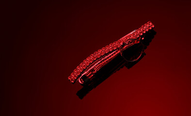 Hairpin with precious stones in red neon light