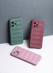Smartphone protective covers on white gray background