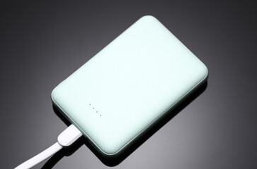 Power bank, external battery on a black background