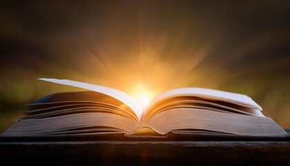 A book is open to a page with a sun shining on it