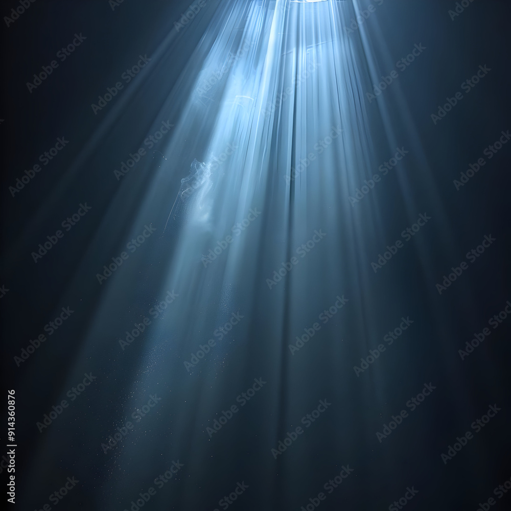 Poster Bright light beams through dark blue water, creating a dramatic scene.