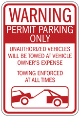 Parking permit signs unauthorized vehicles will be towed at vehicle owner's expense