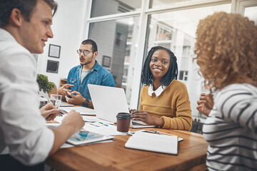 Team, laptop and meeting in office for planning, budget assessment and business strategy. Start up people, tech and documents in city for creative startup, brainstorming and project management