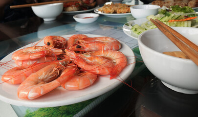 Meal at ha long bay cruise. Red shrimps and others food as a lunch at ha long bay cruise. Vietnamese food.
