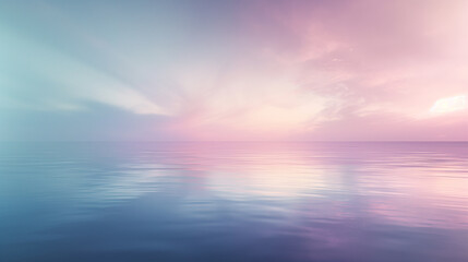 Fototapeta premium A beautiful blue ocean with a pink and purple sky in the background