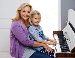 Piano, family and portrait in home for music, development and happy for learning in lounge. Woman, creative and girl or kid in living room with string instrument, keyboard and sound or talent for art