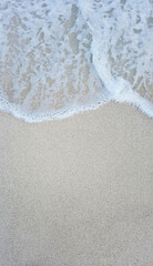 waves on the white sand caribean beach