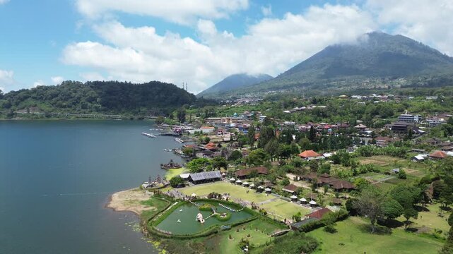 Ulun Danu Beratan Temple in Bali, a popular temple among tourists in the center of Bali island, drone view of the temple and surrounding area