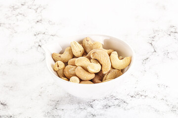 Cashew nuts heap in the bowl
