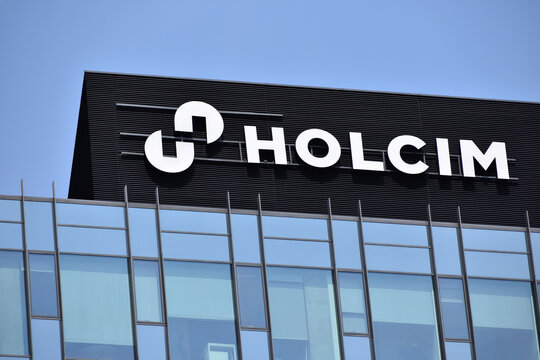 Holcim company logo, emblem, signage on the facade, Swiss building materials and aggregates company. WARSAW, POLAND - JULY 26, 2024