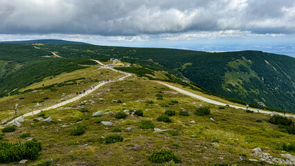 View from the top of Śnieżka in the Polish Karkonosze Mountains. Karpacz. Dom Śląski. 
