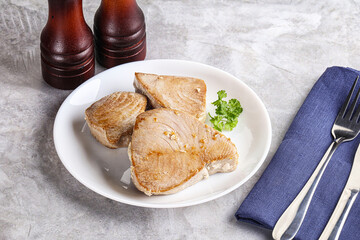 Roasted red tuna steak in the plate