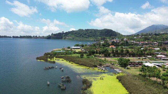 Ulun Danu Beratan Temple in Bali, a popular temple among tourists in the center of Bali island, drone view of the temple and surrounding area