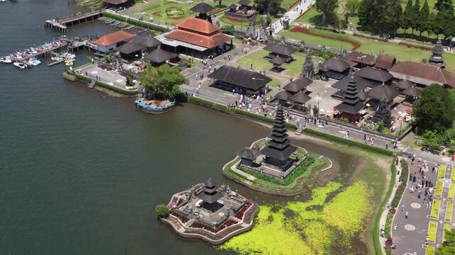 Ulun Danu Beratan Temple in Bali, a popular temple among tourists in the center of Bali island, drone view of the temple and surrounding area