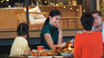 Family gather celebrate holiday. Parents, grandparents and girl together to talk and have dinner...