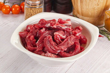 Raw beef meat - sliced strips