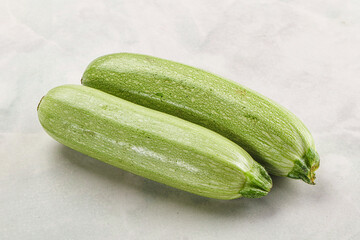 Raw green ripe zucchini vegetable