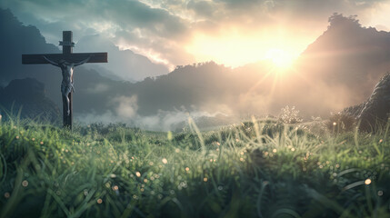 Fototapeta premium Jesus christ on the cross in green grass field with mountain background at sunrise good friday concept christianity religion jesus faith religious easter sunday
