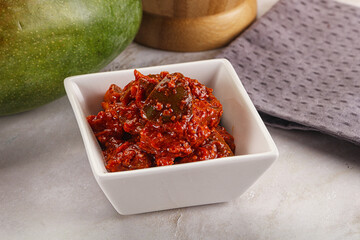 Spicy pickled raw green mango