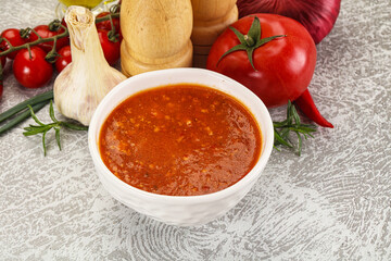 Hot tomato soup with diced chicken