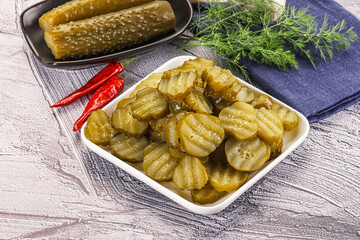Sliced marinated cucumbers in the bowl