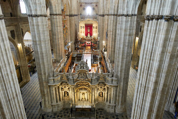 Top view of the central nave, the choir and giant columns inside the Salamanca Cathedral, Castile and Leon, Spain