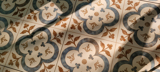 decorative blue and yellow Portuguese flooring, illuminated by the sun