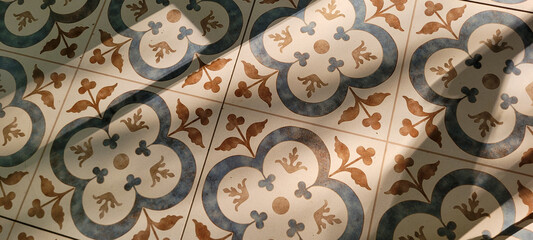 decorative blue and yellow Portuguese flooring, illuminated by the sun