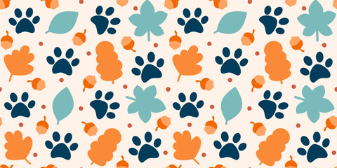 cute hand drawn seamless vector pattern illustration for fall autumn season with orange and blue leaves, acorn and paw prints on cream background
