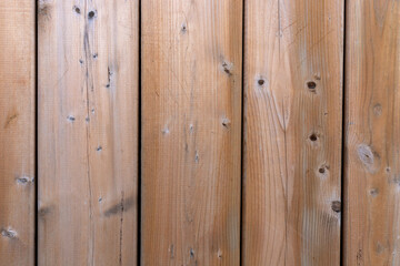 Fototapeta premium Wooden textured fence close up background.